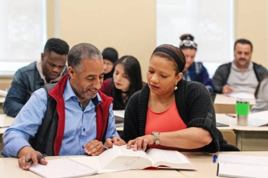 A classroom of immigrants at school