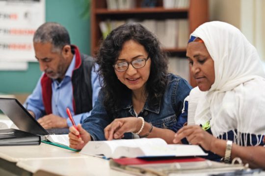 A classroom of immigrants at school