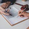 Businessman and lawyer discuss and advice on contract documents. Legal Treaty Agreement business contract