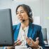 support2 Friendly woman in call center service talking with costumers by headset. Call center and diverse people group in business.